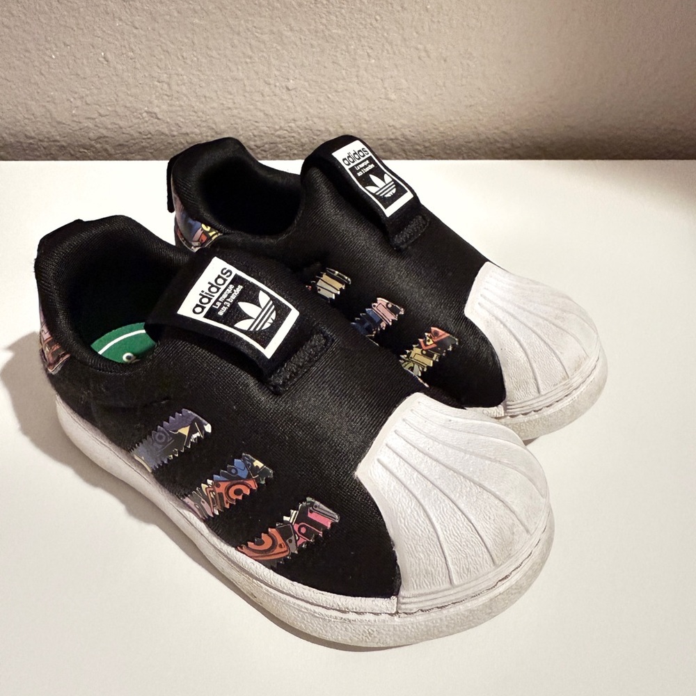 Adidas Black and White Sneakers with Iconic Shell Toe